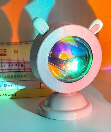 Regenboog projector met leuke konijnenoren