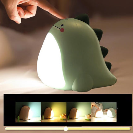 Groen dinosaurus nachtlampje met lichtgevende buik
