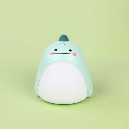 Groen dinosaurus nachtlampje met lichtgevende buik