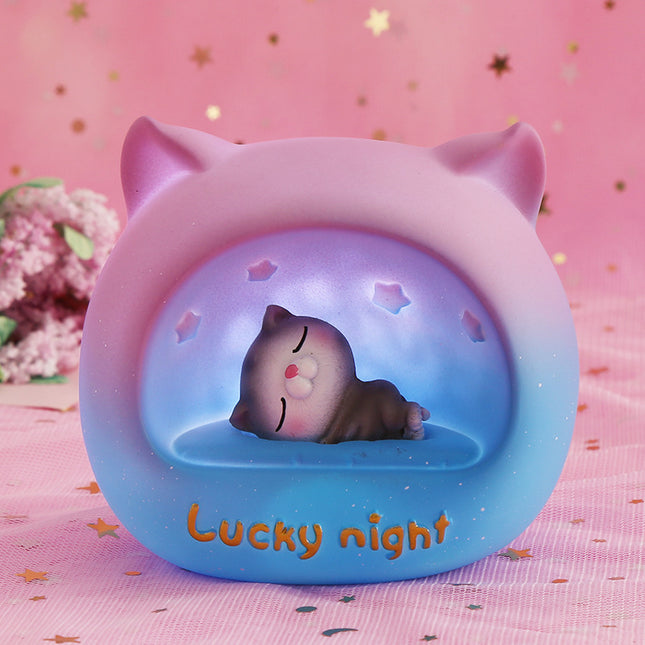 Rond LED nachtlampje met slapende kat