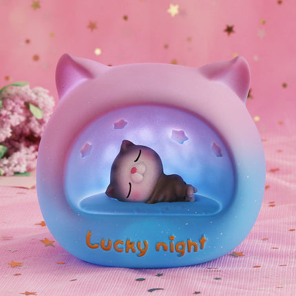 Rond LED nachtlampje met slapende kat