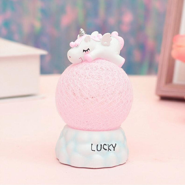 Nachtlampje eenhoorn op een roze bal