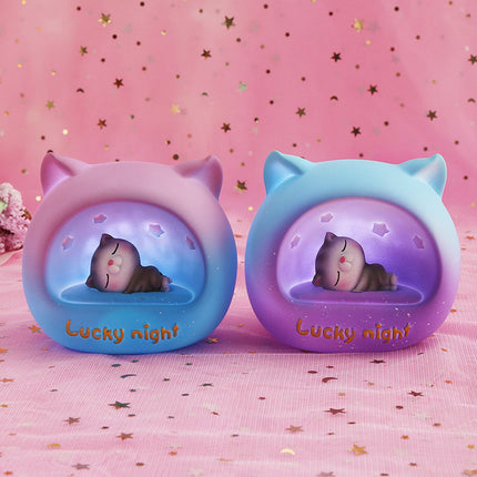 Rond LED nachtlampje met slapende kat