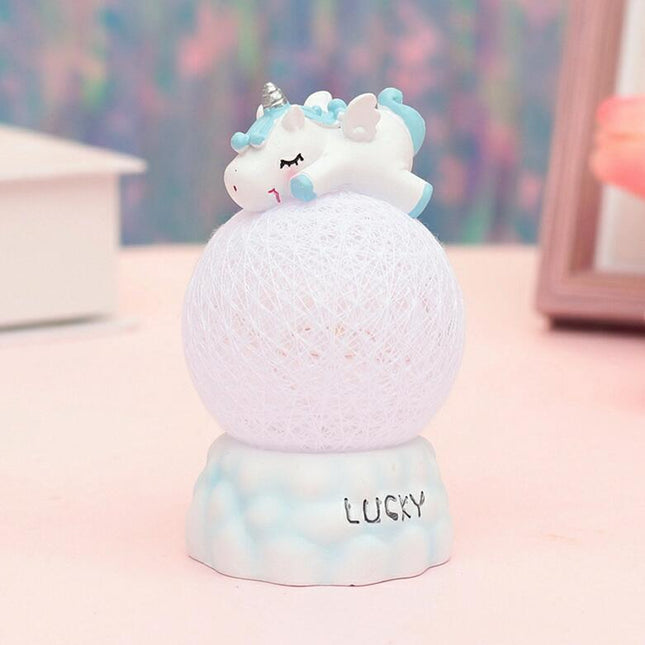 Nachtlampje eenhoorn op een roze bal