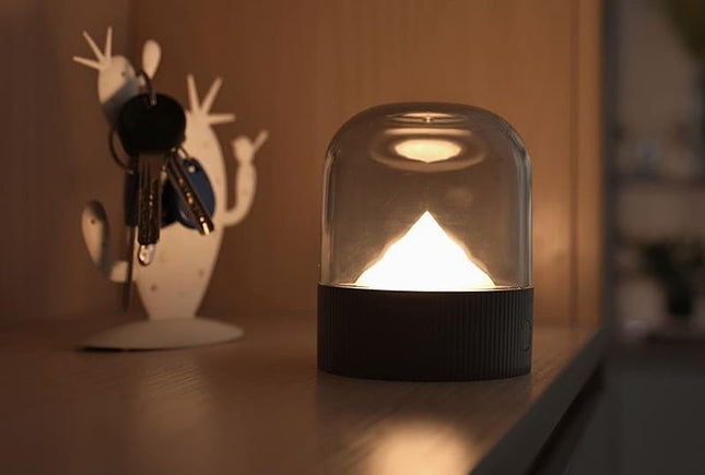 Slaapkamer nachtlampje met besneeuwde berg