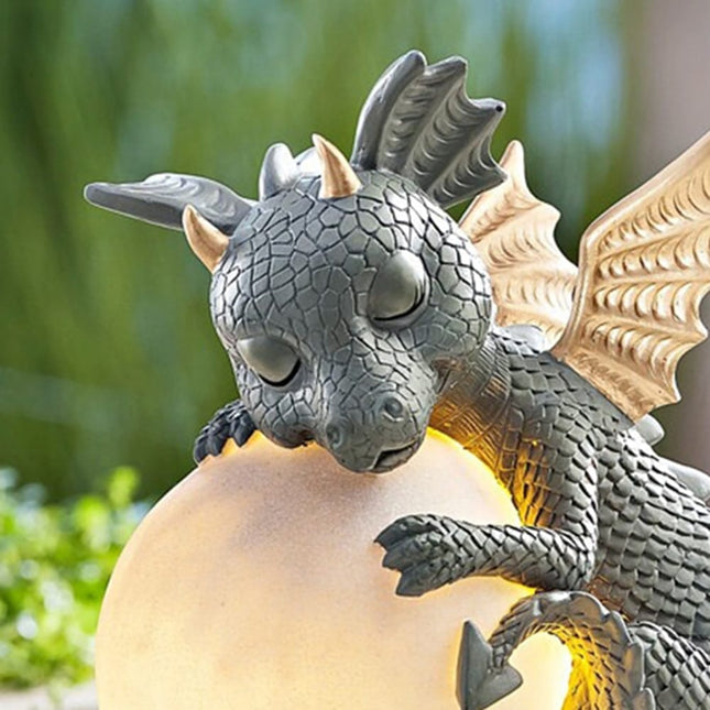 3D hars draak met lichtgevende bol
