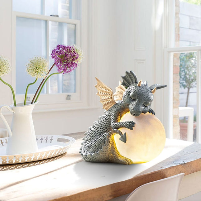 3D hars draak met lichtgevende bol